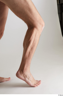 Arvid  1 calf flexing nude side view 0011.jpg